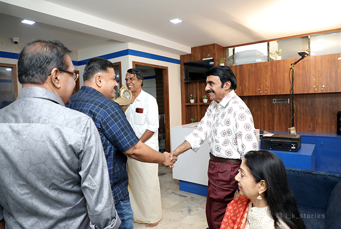 Aradhana Building MD annd Mr Kabir Sir, greeting each other.